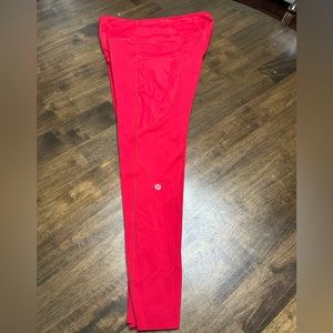Women’s LuluLemon Fast and Free High-Rise Tight 25”. Color: Dark Red. Size: 8